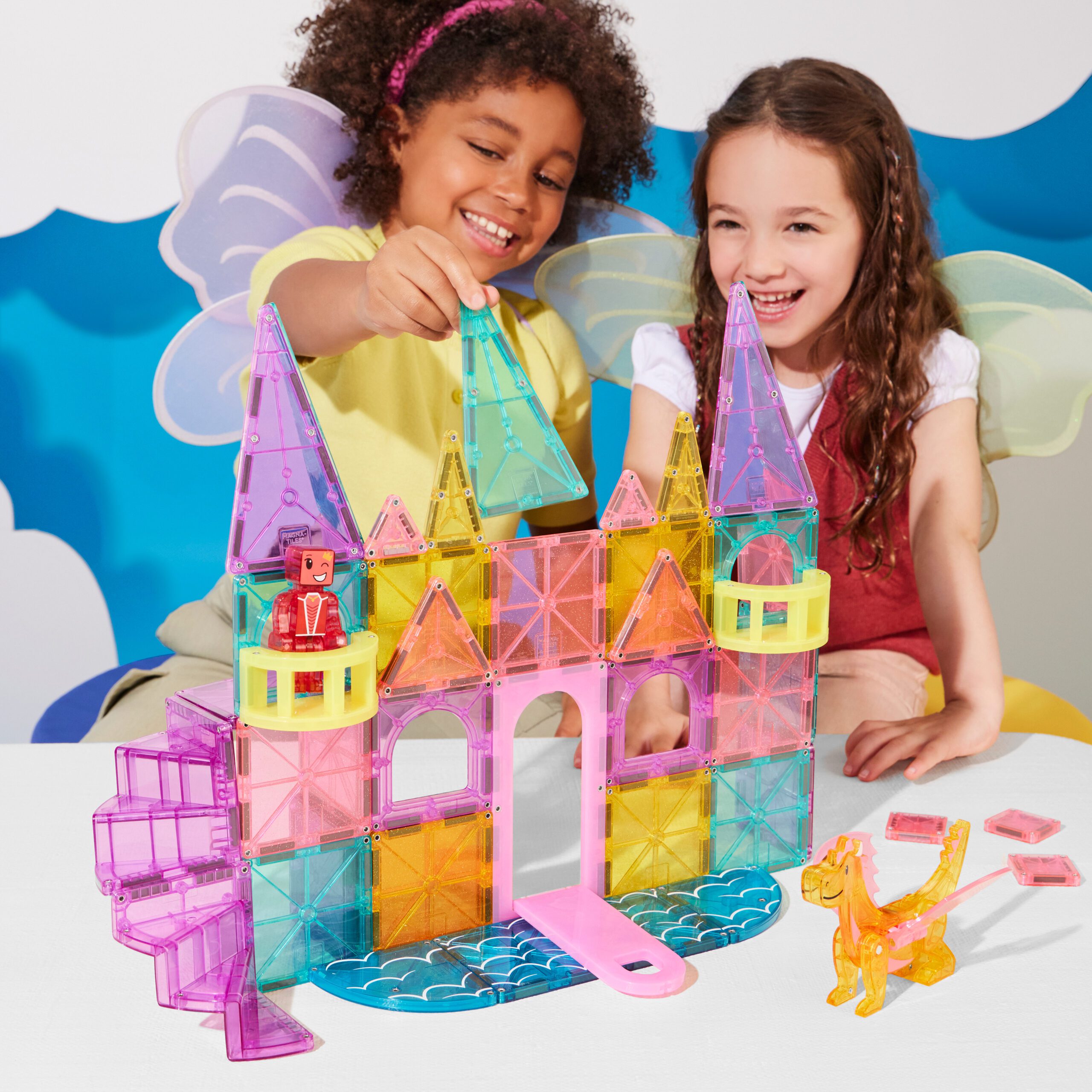 Two Children playing with Castle DLX 48-Piece Set