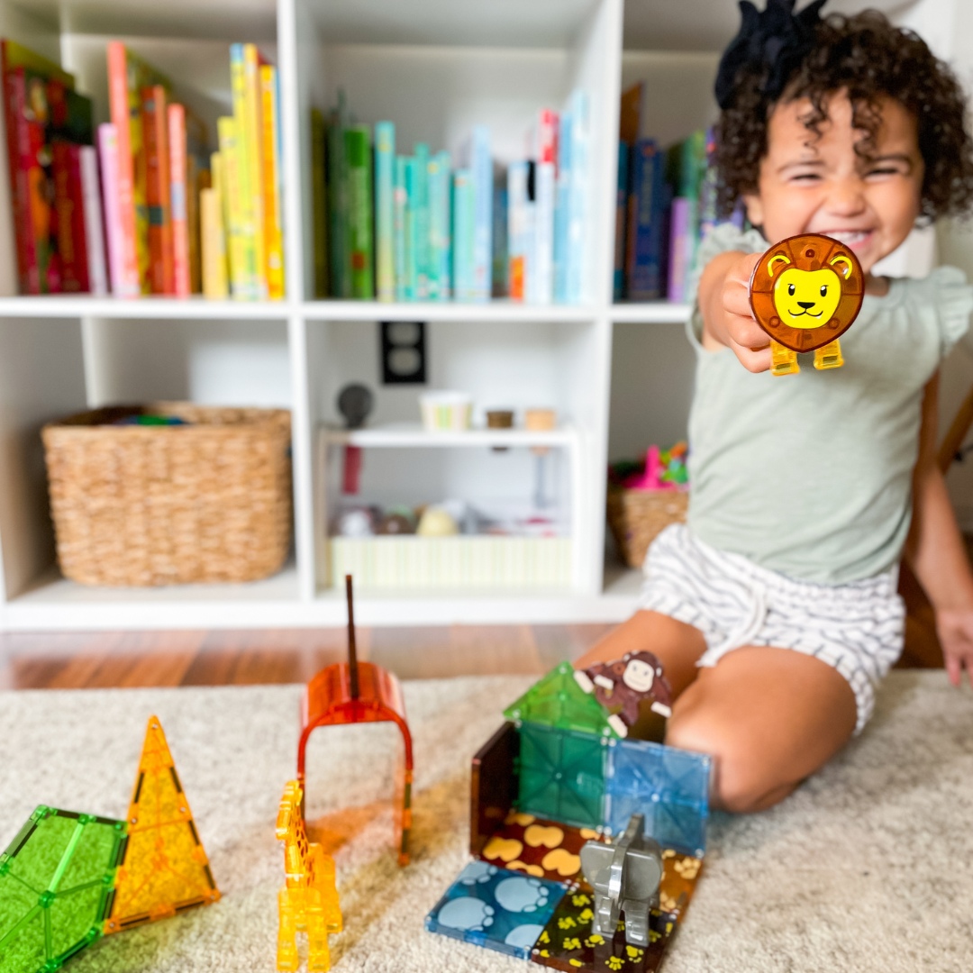 Child playing with MAGNA-TILES Safari Set