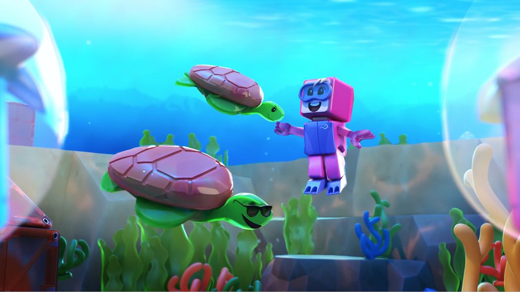 Pink robot floating beside two turtles in an animated underwater adventure scene with colorful sea plants