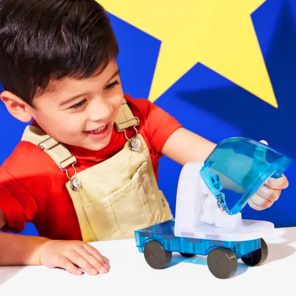 Child opening the space capsule